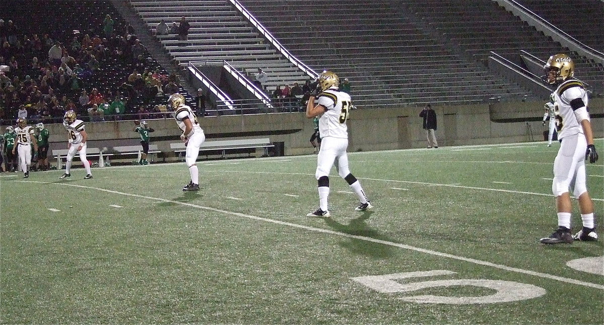 Image: Gladiators Cody Medrano(75), Kyle Fortenberry(66), Zain Byers(50), Zackery Boykin(55) and Hunter Merimon(45) prepare for the opening kickoff.