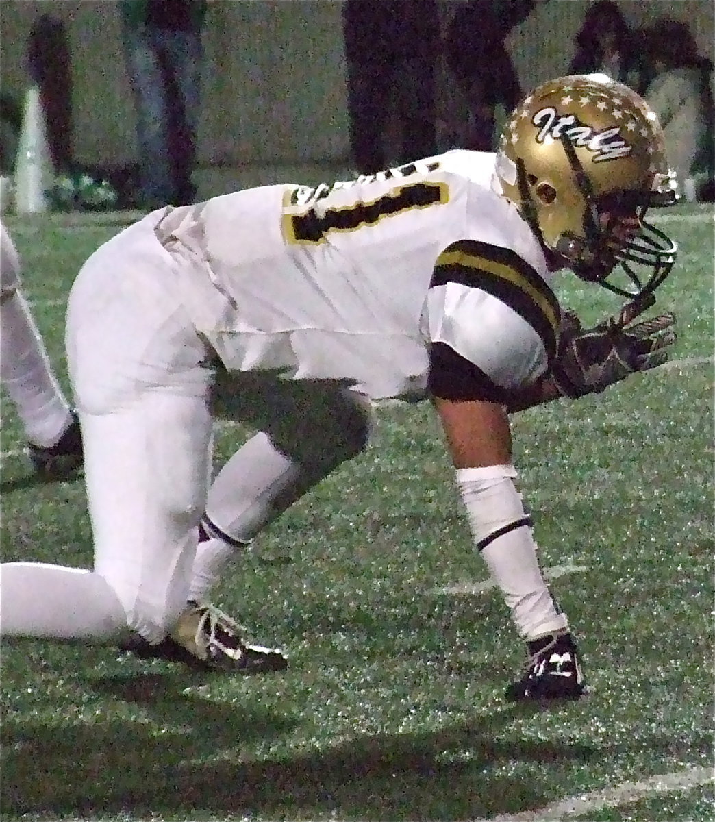 Image: Gladiator defensive tackle Reid Jacinto(11), a senior, is poised for the attack.