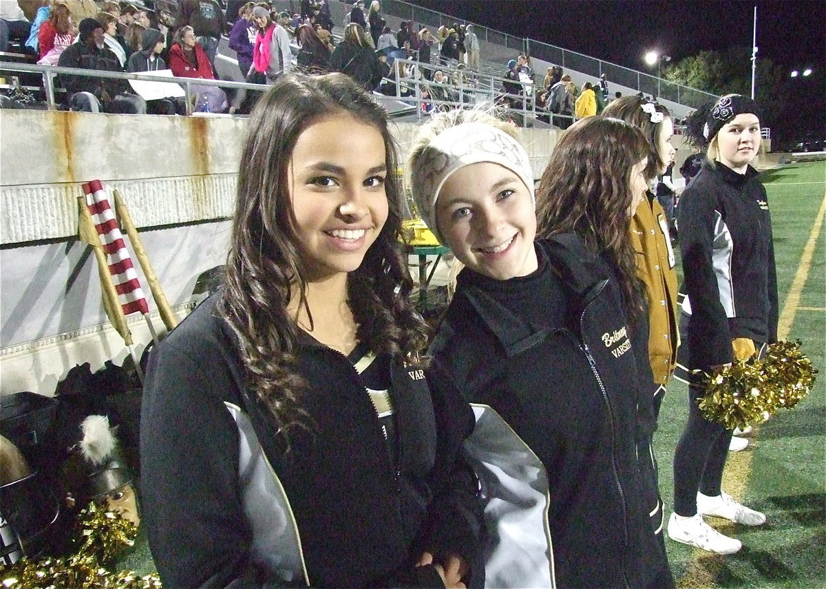 Image: Cheerleaders Ashlyn Jacinto and Britney Chambers are enjoying the playoff atmosphere.