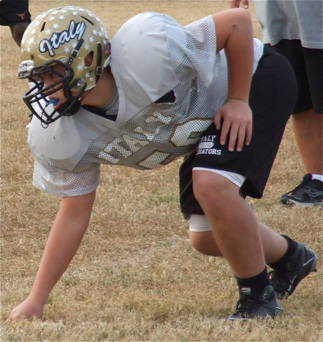 Image: Defensive tackle Zain Byers gets some work done during a drill.