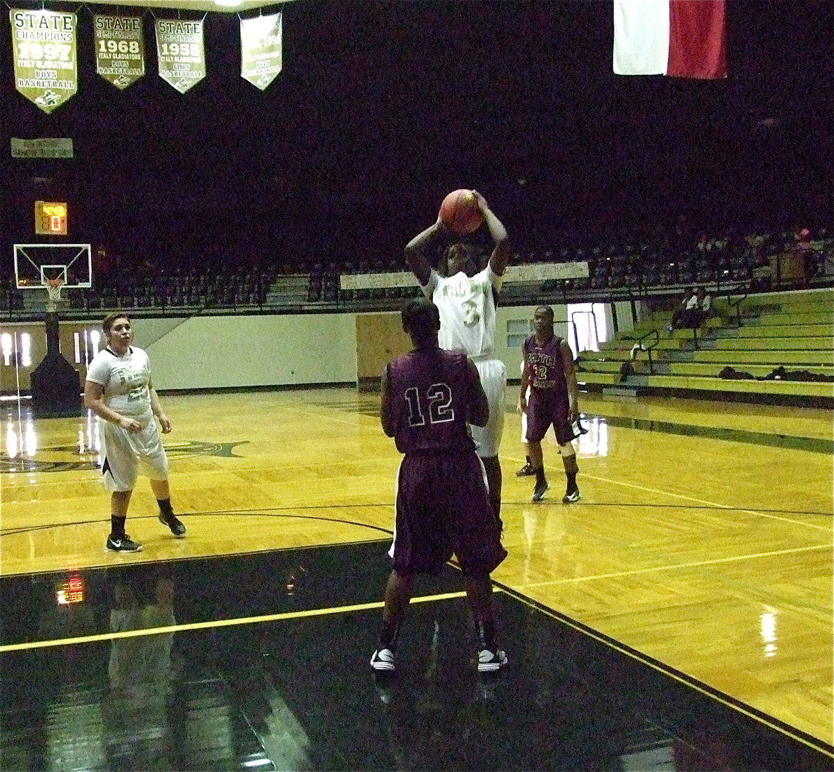 Image: Kortnei Johnson(3) rises for 2-points over a Faith Family defender.