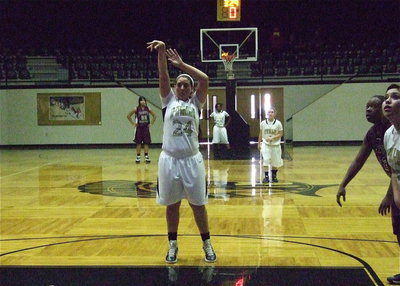 Image: Alyssa Richards(24) puts in a foul shot to go 4-of-4 from the free-throw line against Faith Family for a game total of 4-points.