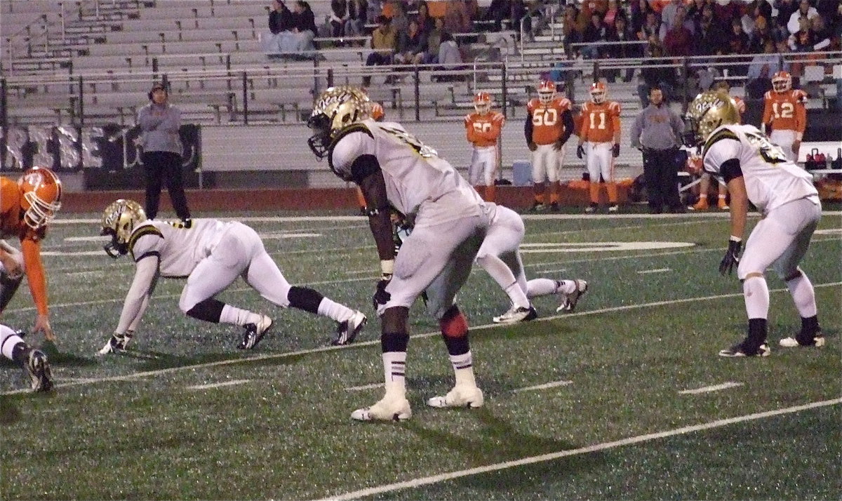 Image: Gladiator linebackers Ryheem Walker(10) and Shadrach Newman(25) prove they are too physical for the Warriors offense.