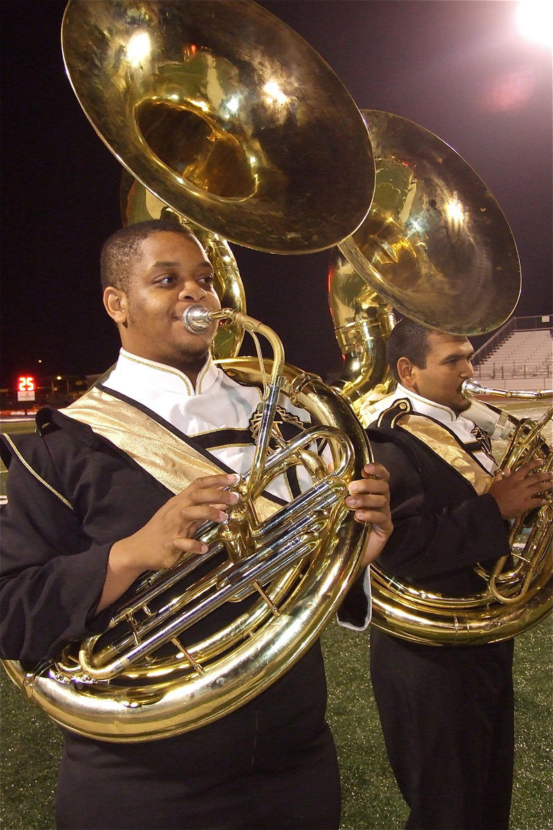 Image: The tuba section: Gladiator Regiment Band members Timothy Fleming and Jonathan Davila rock the halftime performance.