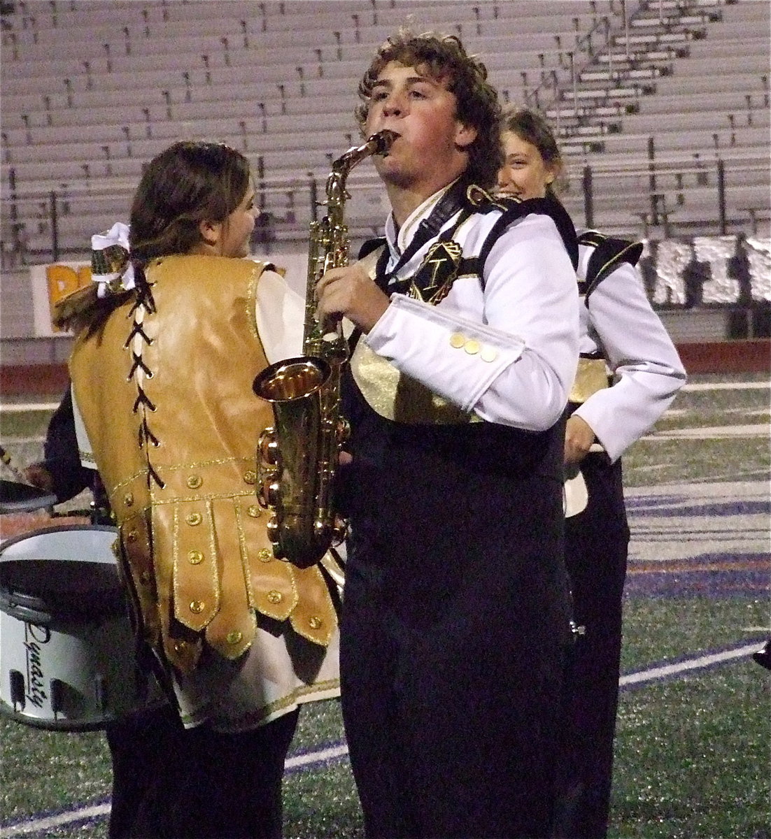 Image: JoeMack Pitts displays his skills during a quick halftime solo with his band mates providing some background music.