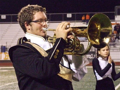 Image: Italy’s Hunter Wood joins in with his fellow band members during their halftime performance.