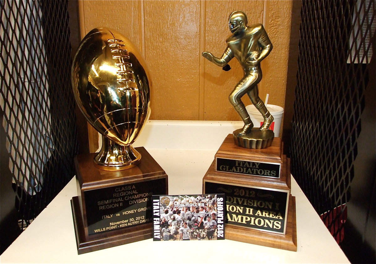 Image: The Gladiators might need more shelf space as playoffs progress. The Area and Regional Semifinal Championship trophies currently reside in the team’s locker room.