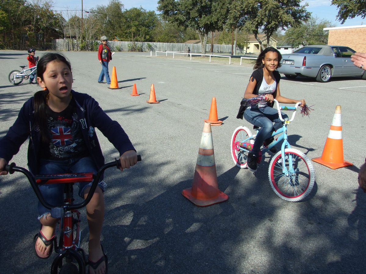 Image: The girls pictured were trying to be the last one at the finish line.