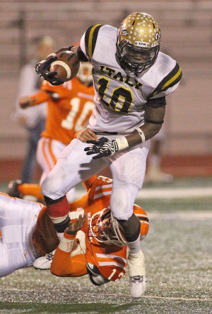 Image: Gladiator senior tailback Ryheem Walker(10) bulldozed over Honey Grove Warrior defenders for 200 yards rushing and 1 touchdown, paving the way for senior quarterback Marvin Cox who rushed for 238 yards on 16 carries and 4 touchdowns. Italy will face Goldthwaite in the Division I-A Region II Quarterfinal Championship game on Friday, December 7, starting at 7:30 p.m. in Glen Rose.