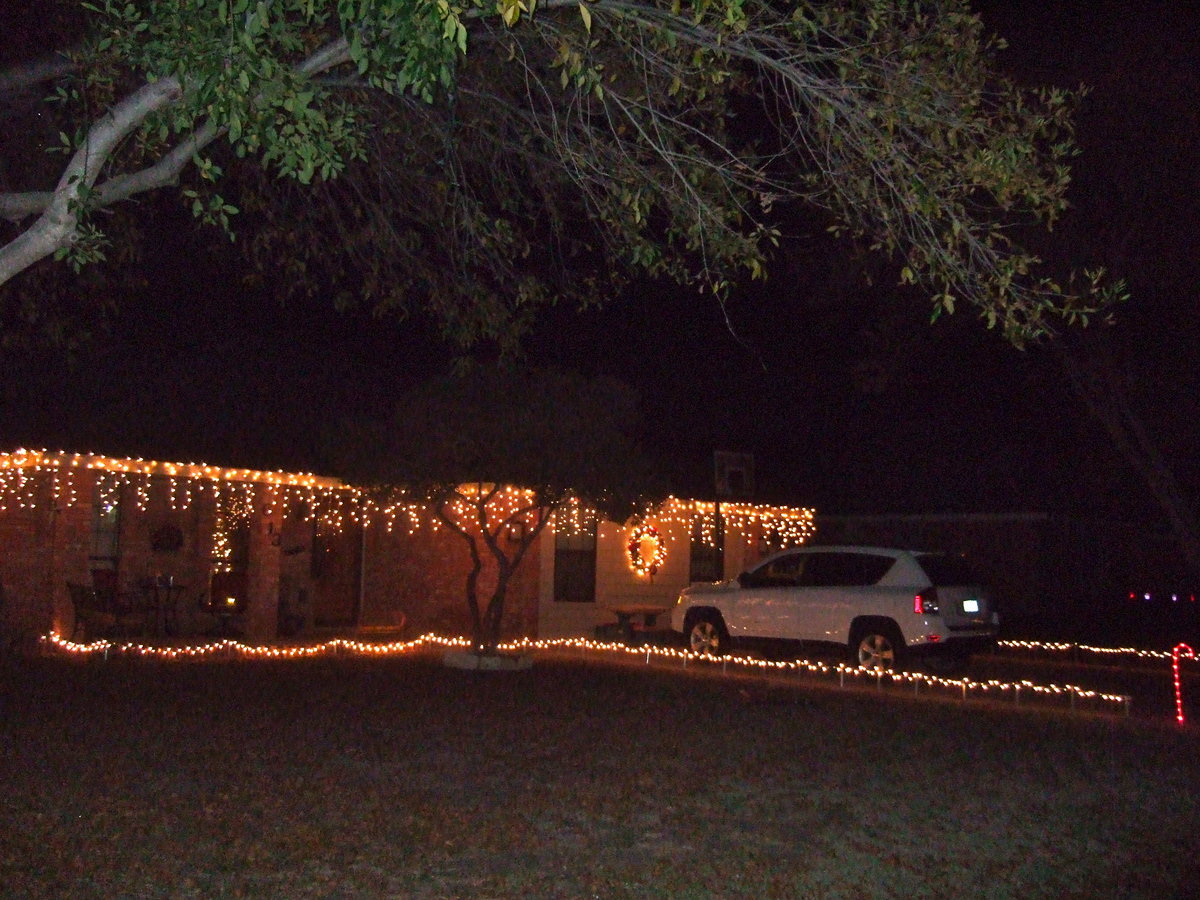 Image: This house is lit up in lights.