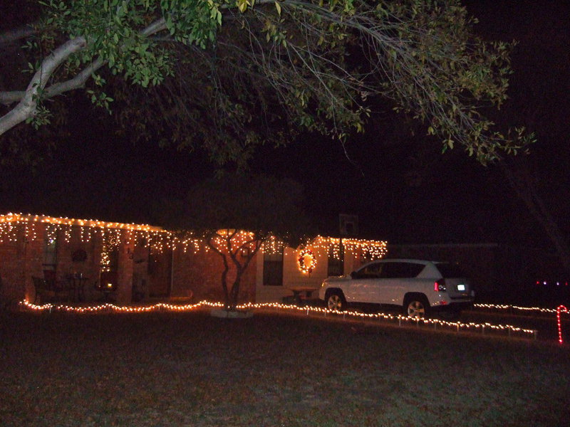 Image: This house is lit up in lights.