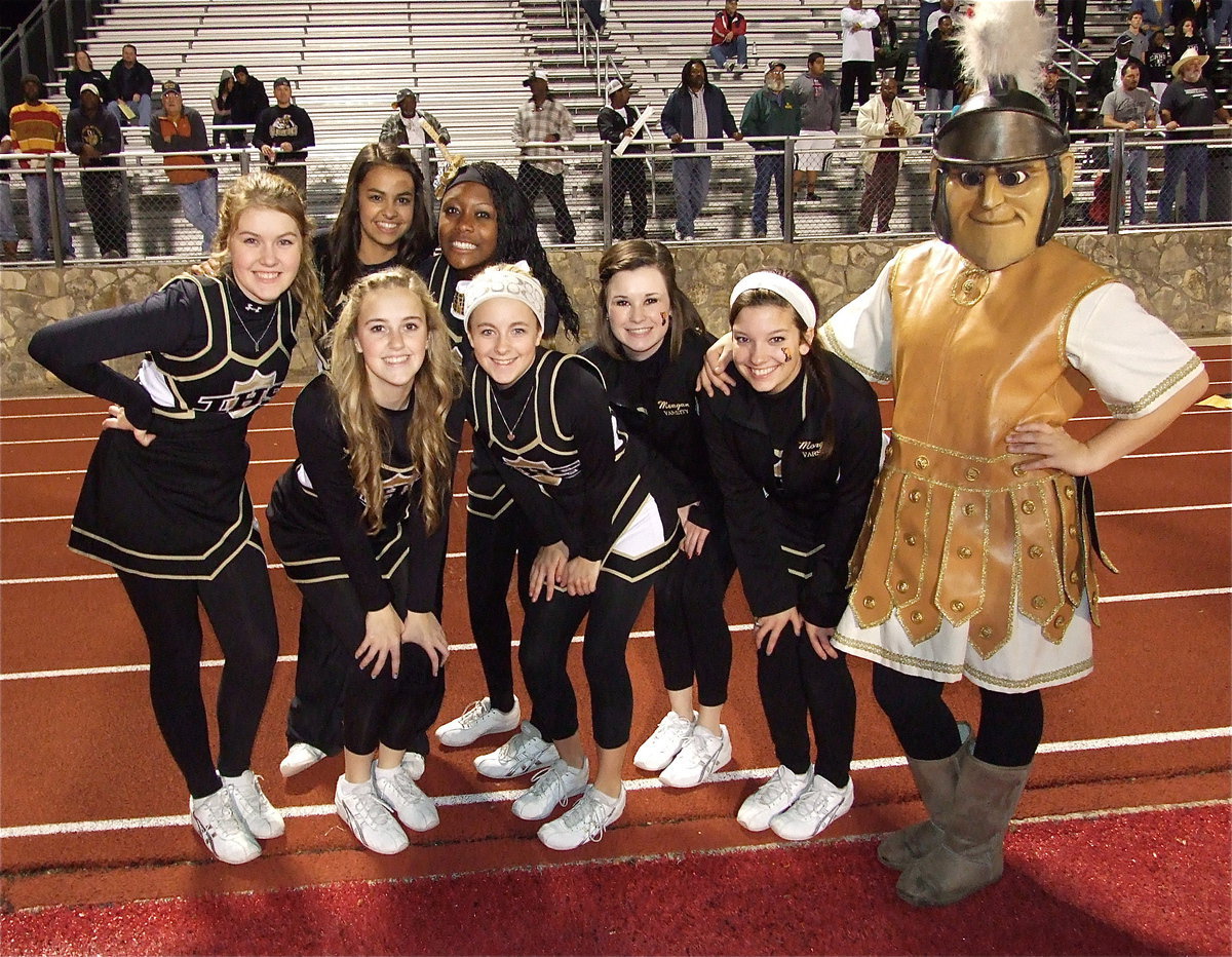 Image: Cheerleaders Taylor Turner, Ashlyn Jacinto, Kelsey Nelson, K’Breona Davis, Britney Chambers, Meagan Hooker, Morgan Cockerham and mascot Reagan Adams are enjoying the moment.