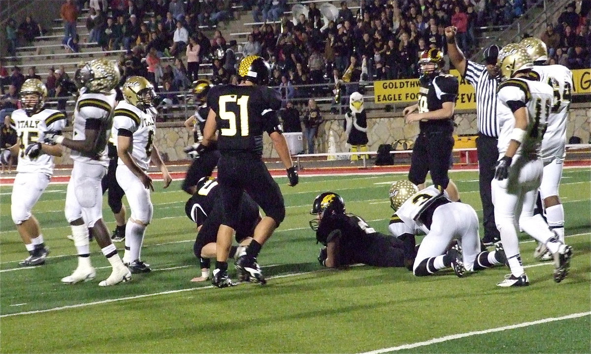 Image: Gladiator Marvin Cox(3) brings down Dakota Perry(2).