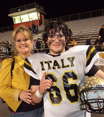 Image: Gladiator sophomore Kyle Fortenberry(66) with his mom, Robbie Addington-Jones, after Italy stuns the Goldthwaite Eagles 14-3 in the 4th round of the Region II Division I Class A playoffs.