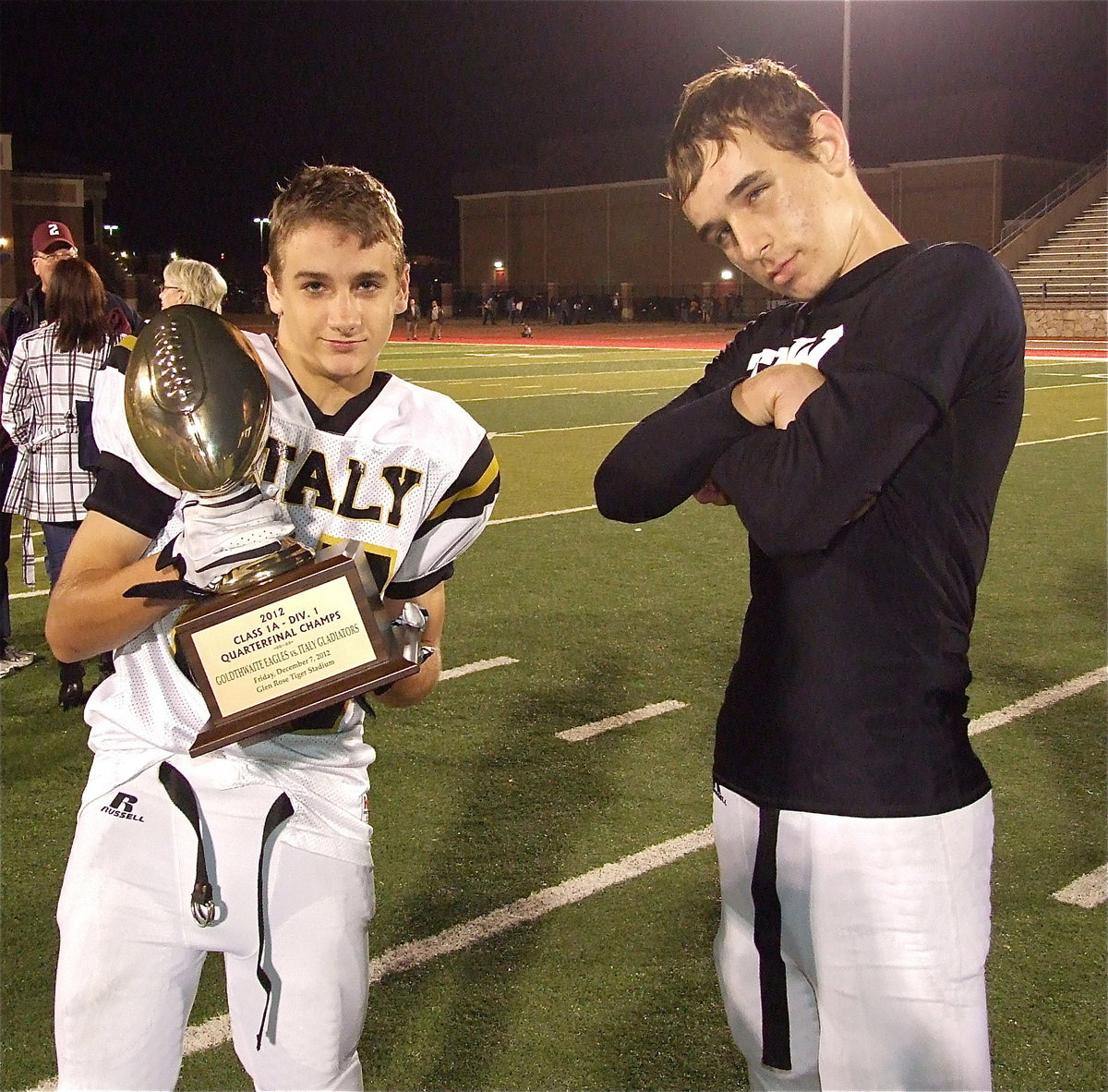 Image: Gladiator teammates Levi McBride(85) and Ryan Connor(7) display their championship swag.