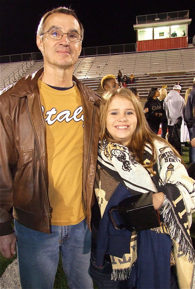 Image: Stevan Varner and his daughter Jill Varner are enjoying the post-game celebration at Tiger Stadium in Glen Rose after Italy’s 14-3 regional quarterfinal win over Goldthwaite.