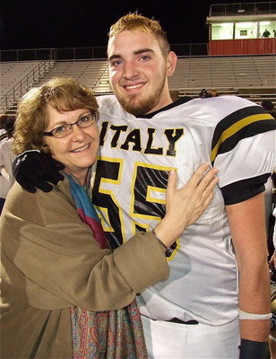 Image: Sally Arthur is proud of her baby, that big, mean, right offensive tackle for Italy, Zackery Boykin(55).