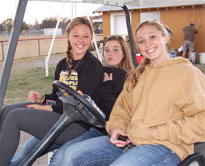 Image: Bailey Eubank, Reagan Adams and Jaclynn Lewis relax on the golf cart moments before Lewis accidentally hits the gas. Thankfully, no photographers were injured while taking this picture.