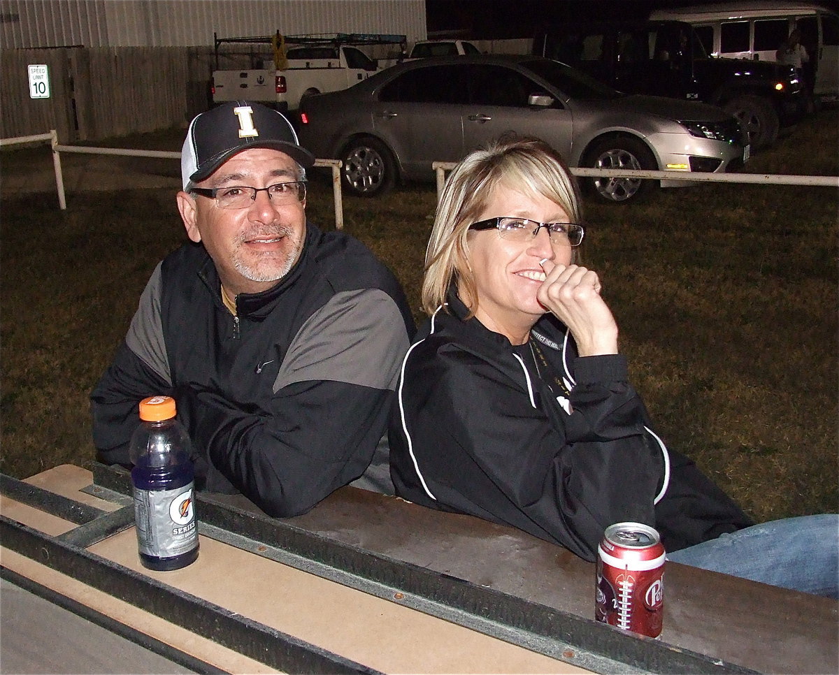 Image: Finally, Vincent and Lisa Jacinto have a romantic moment together after serving hamburgers, that is before the photographer showed up.