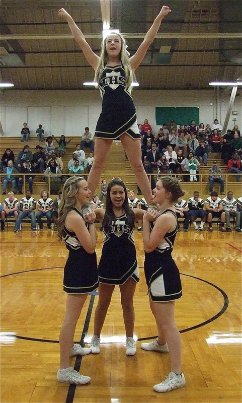 Image: IHS cheerleaders Britney Chambers and cheermates Kelsey Nelson, Ashlyn Jacinto and Taylor Turner helped the Gladiators soar over the Eagles.