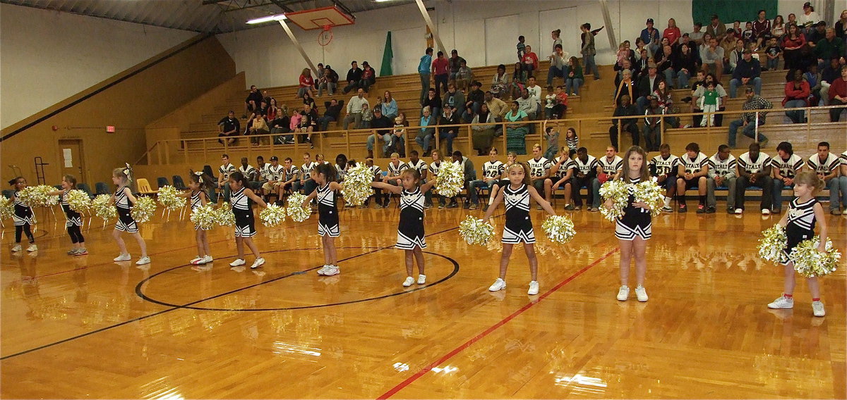 Image: The IYAA C-Team cheerleaders (K-2nd) show their support for the Gladiators!