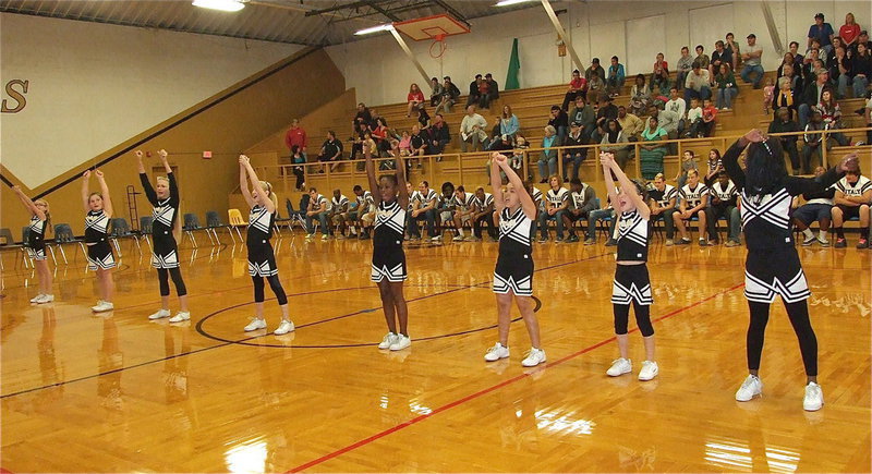 Image: The IYAA A-Team and B-Team cheerleaders (3rd-6th) give a cheer for the Gladiators during the pep rally this past Thursday inside the old gym.