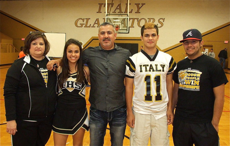 Image: Reid Jacinto(11) stands with members of his family after Thursday’s pep rally.