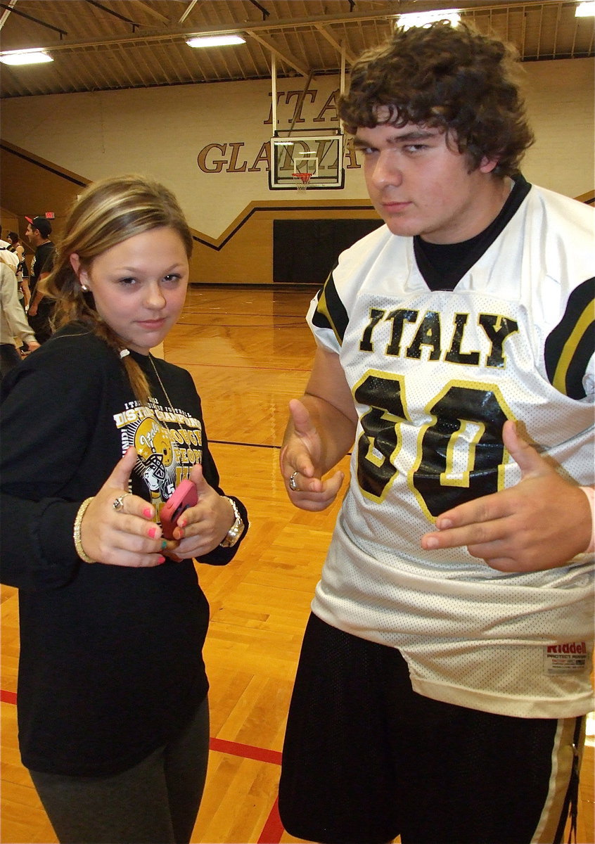 Image: Bailey Eubank and Kevin Roldan(60) ask, “Are you ready for some Gladiator Football?!”