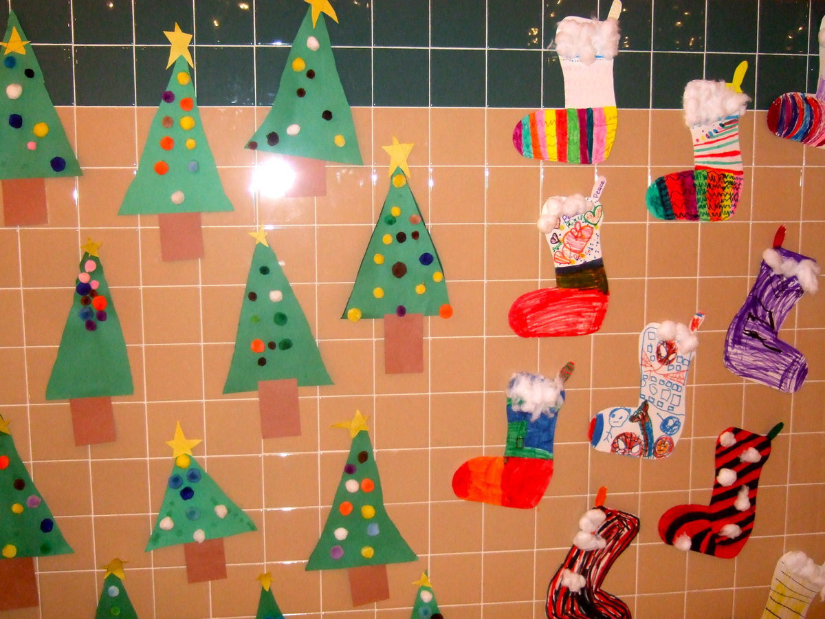 Image: Handmade Christmas trees and stockings created by Stafford students.