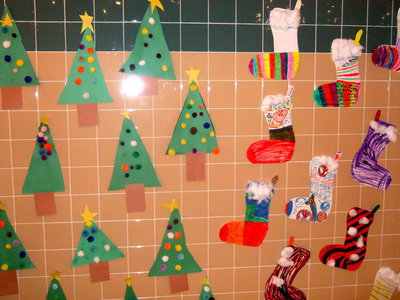Image: Handmade Christmas trees and stockings created by Stafford students.