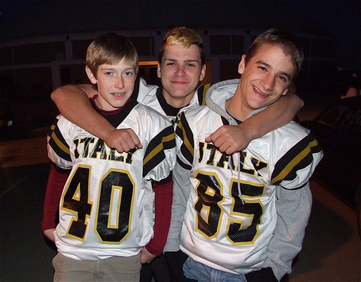 Image: Gladiators Clayton Miller(40), Hunter Merimon(45) and Levi McBride(85) are ready to get their pep rally on.