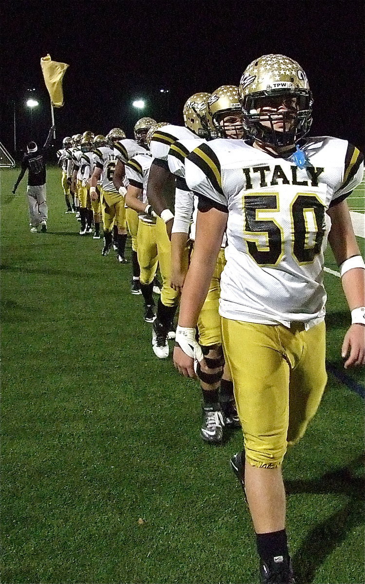 Image: Zain Byers(50) and his Gladiator teammates prepare for their biggest challenge of the season.