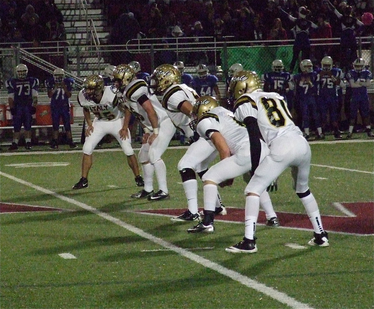 Image: Cody Medrano(75), Kyle Fortenberry(75), Zackery Boykin(55), Hayden Woods(8) and Kelvin Joffre(80) prepare for the kickoff.