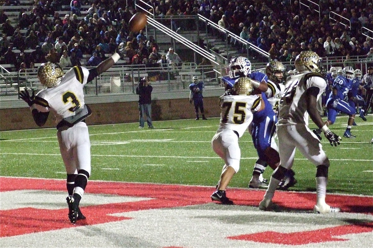 Image: Marvin Cox(3) tries to pass Italy out of trouble while Cody Medrano(75) and Ryheem Walker(10) give him time to throw.