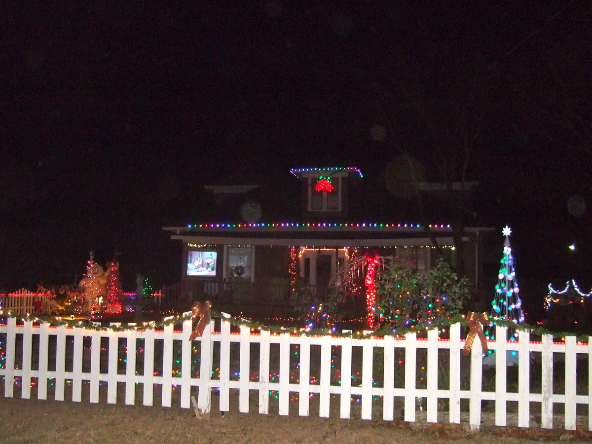 Image: First place winner was the residence of Conrad and Gayle Kinsey, complete with an outdoor theater to watch Rudolph.