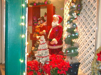 Image: Magic Mirror won the Christmas light contest for businesses. This is one magical window front starring Santa Clause.