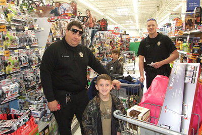 Image: “Clean up on isle 12!” Officer Eric Tolliver and Officer Mike Richardson hope to have the situation under control while Chance Shaffer and Mitchell Darell terrorize isle 12.