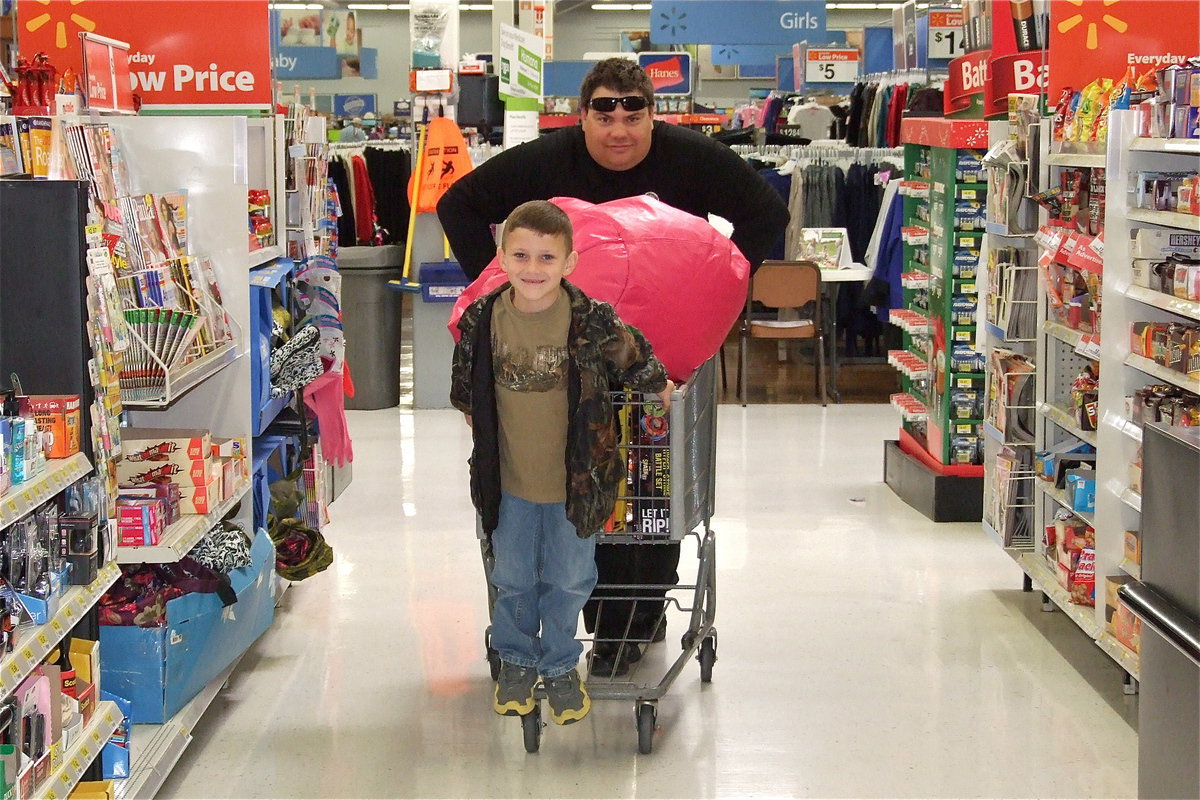 Image: “Calling all carts!” Officer Eric Tolliver and Chance Shaffer race to the finish line.