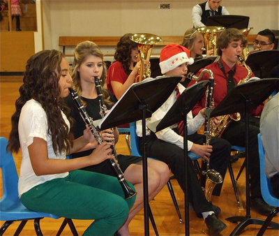 Image: Vanessa Cantu, Halee Turner, Lillie Perry, Blake Brewer, Hannah Washington, JoeMack Pitts, Pedro Salazar and Gus Allen in the back play beautiful Christmas music together.