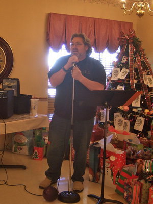 Image: Barry Wilsford singing I’ll Have a Blue Christmas Without You.