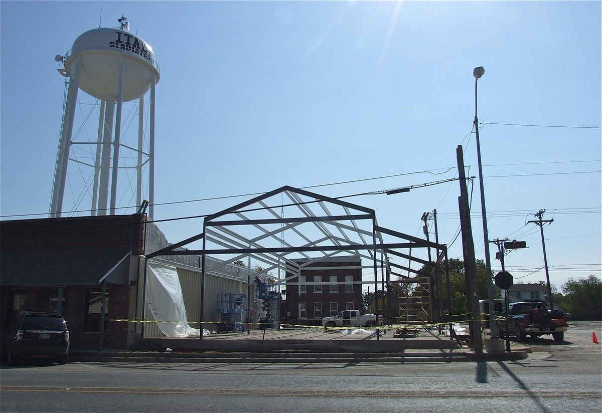 Image: The frame of the pavilion is nearly in place in time for roofing and bricking the columns and pony walls.