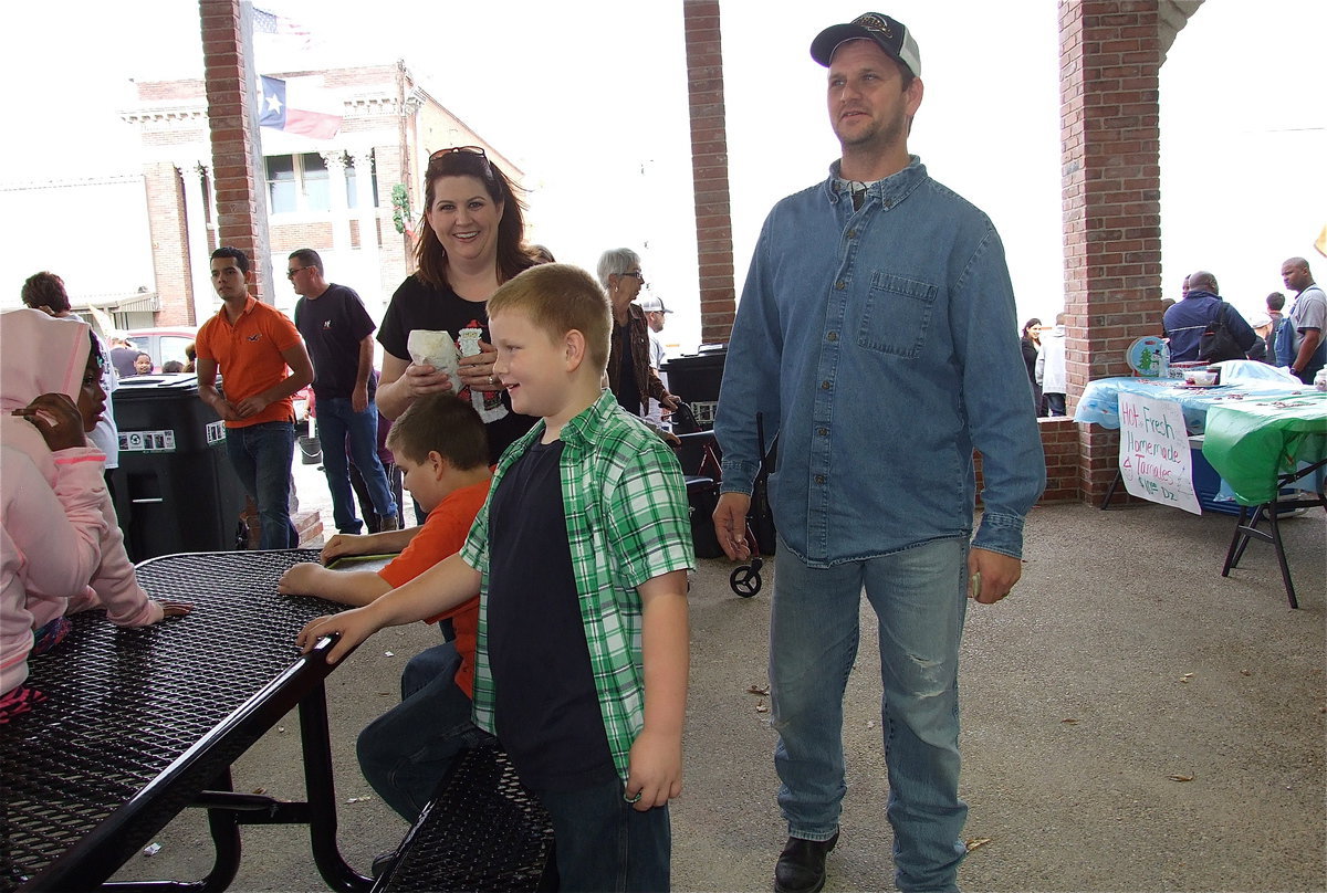 Image: Kelli and Daniel Ballard, with two of their sons Wyatt and Bryce Ballard, take in the goings on inside the pavilion which is located across from Italy City Hall.