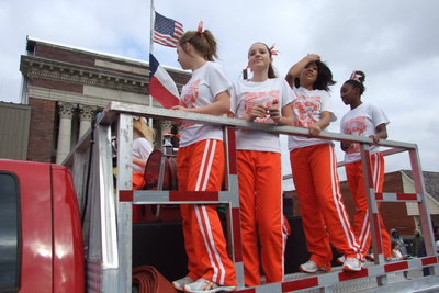Image: The Avalon High School Cheerleaders are flying high during the parade on the back of an Avalon fire truck.