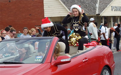 Image: Italy High School cheerleaders Ashlyn Jacinto and Britney Chambers with Bobbie Hyles driving.