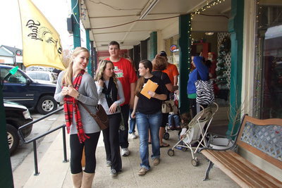 Image: Madison Washington, Maddie Pittman, Zac Mercer and Reagan Adams are out selling raffle tickets to festival goers. The IHS class of 2015 raffled off a new iPad during the festival.