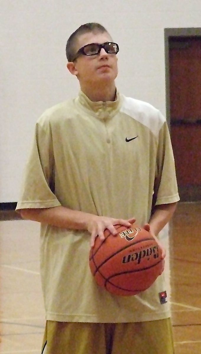 Image: Italy’s Brandon Connor eyes the rim from the free-throw line during the pre-game.