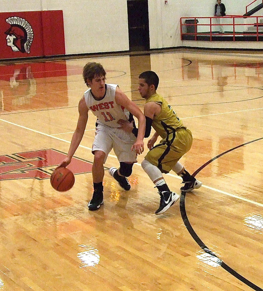 Image: Gladiator Caden Jacinto(2) plays tight defense on the ball.