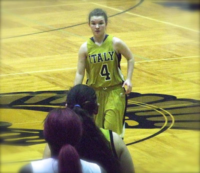 Image: Lady Gladiator sophomore point guard Tara Wallis(4) brings the ball up court for Italy.