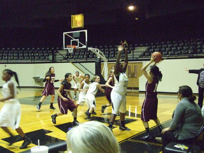 Image: Taleyia Wilson #22 guards for the an inbound attempt by the Lady Skyhawks.