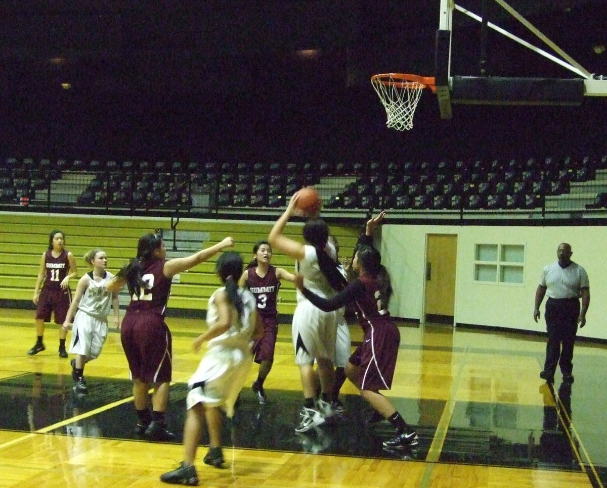 Image: Alyssa Richards #24 goes back up with the shot.